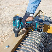 Makita DTW700 ergonomic grip detail in black and blue