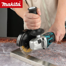 Makita DGA504 lifestyle shot, person using black and blue angle grinder