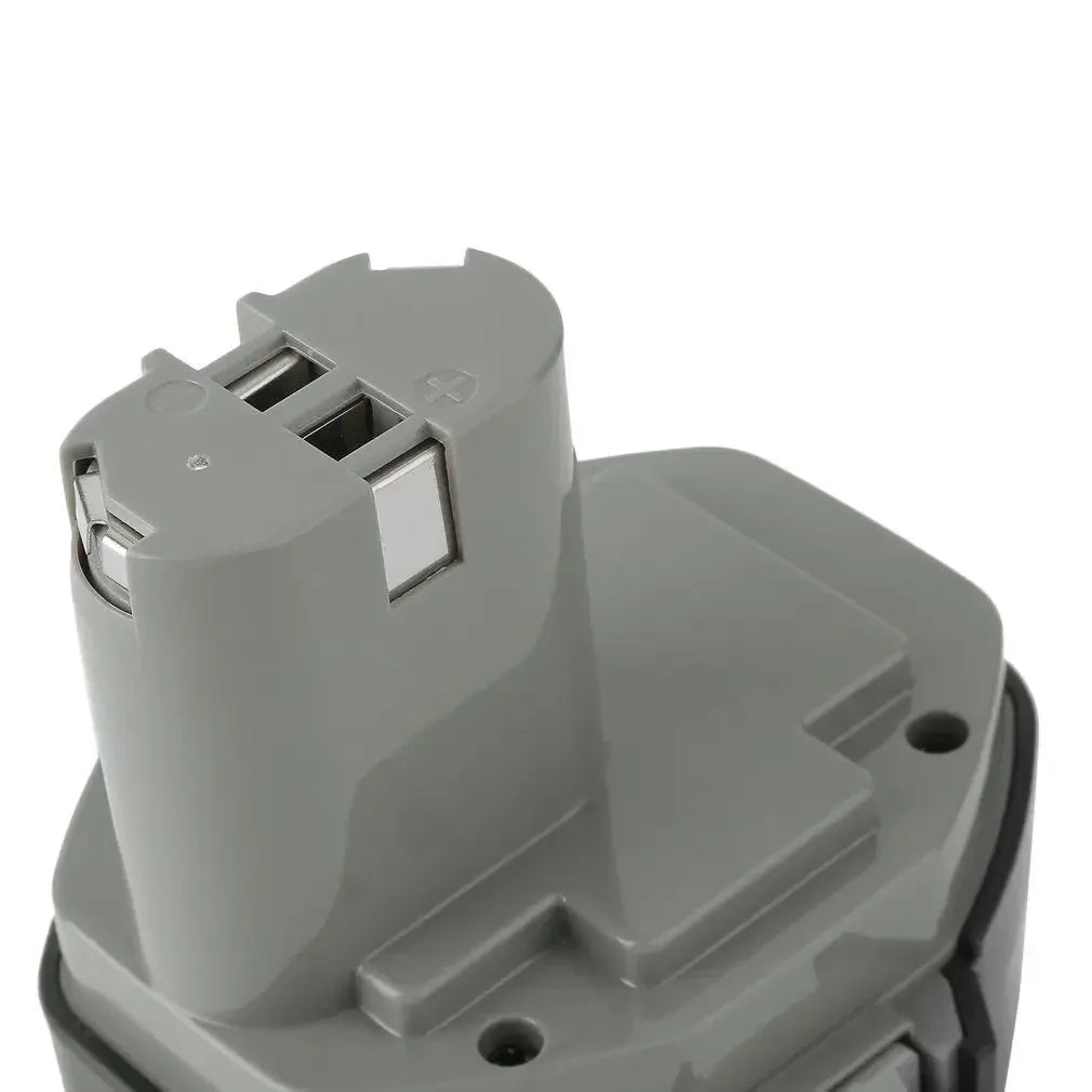 14.4V NI-CD Makita battery pack terminal close-up, gray and black