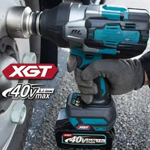 Makita 40V XGT battery impact wrench detail, black and blue with ergonomic grip