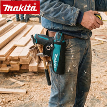 Makita DF330 handheld drill lifestyle on wooden background