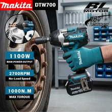 Makita DTW700 lifestyle impact wrench, blue and black, ergonomic grip