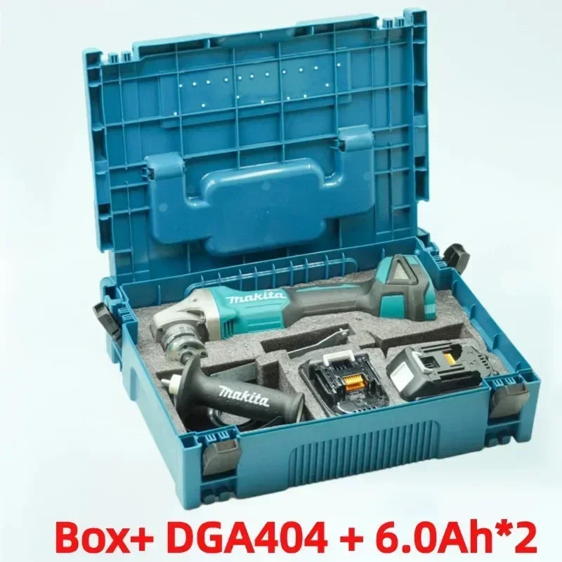 Makita DGA404 kit packaging, blue/black toolbox with battery and accessories on white