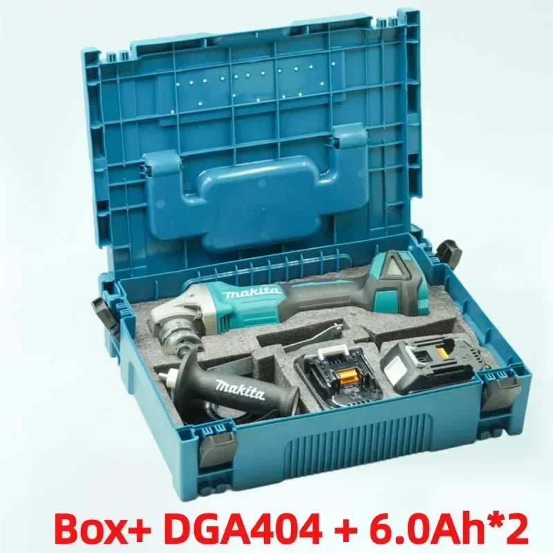 Makita DGA404 kit packaging, black and teal accessories and storage box