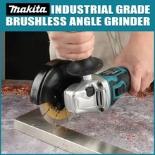 Makita DGA504 detail close-up of brushless motor and cutting disc, black and blue