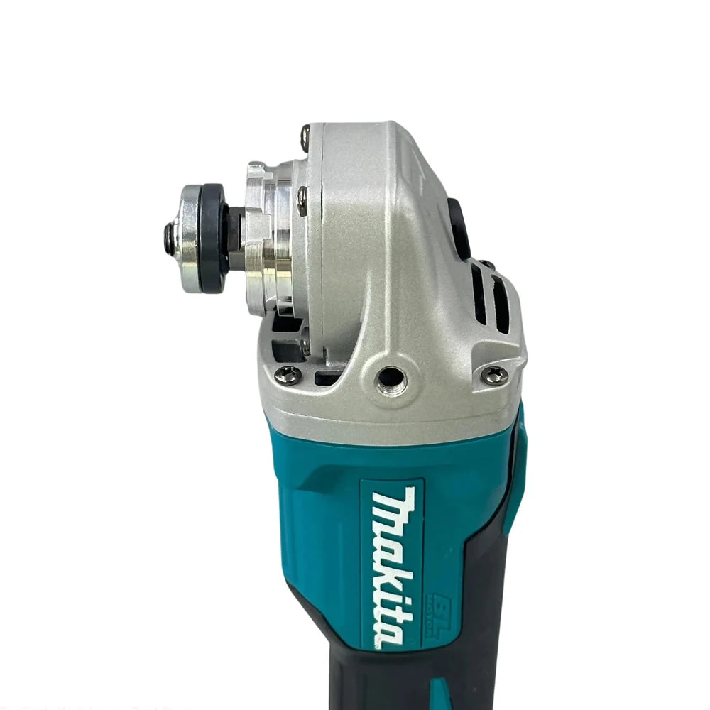 Makita DGA404 head detail, silver and blue angle grinder with adjustable guard