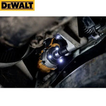 DEWALT DCF922 lifestyle shot with onboard LED work lights