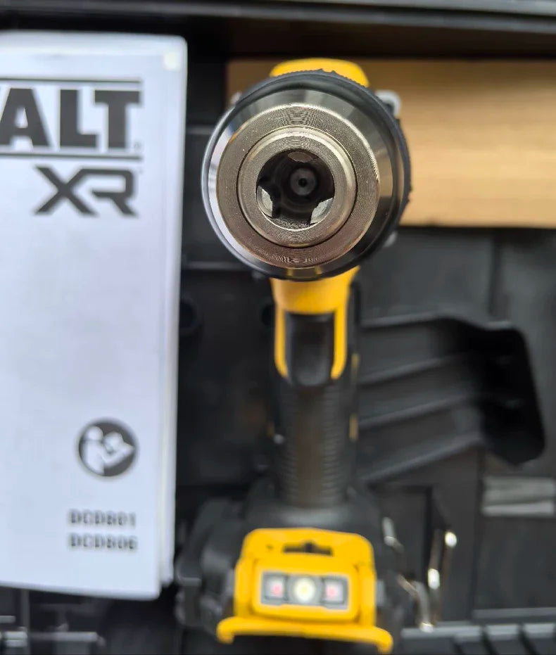 DEWALT DCD806 side view with battery compartment, yellow and black cordless hammer drill