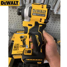 DEWALT 20V impact driver side view in hand, trigger and battery pack