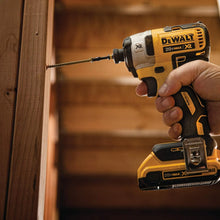 DEWALT impact driver front view, compact yellow and black design with brushless motor