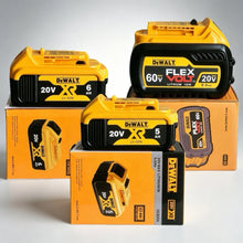 Dewalt 20V battery packs front view, yellow packs on studio display