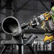 DEWALT DCD1007 drill in use lifestyle shot, industrial setting