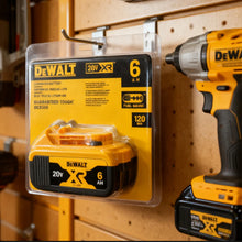 DeWalt 20V battery with drill, yellow and black outdoor lifestyle shot