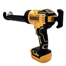 DeWALT electric glass glue gun detail trigger close-up, yellow and black