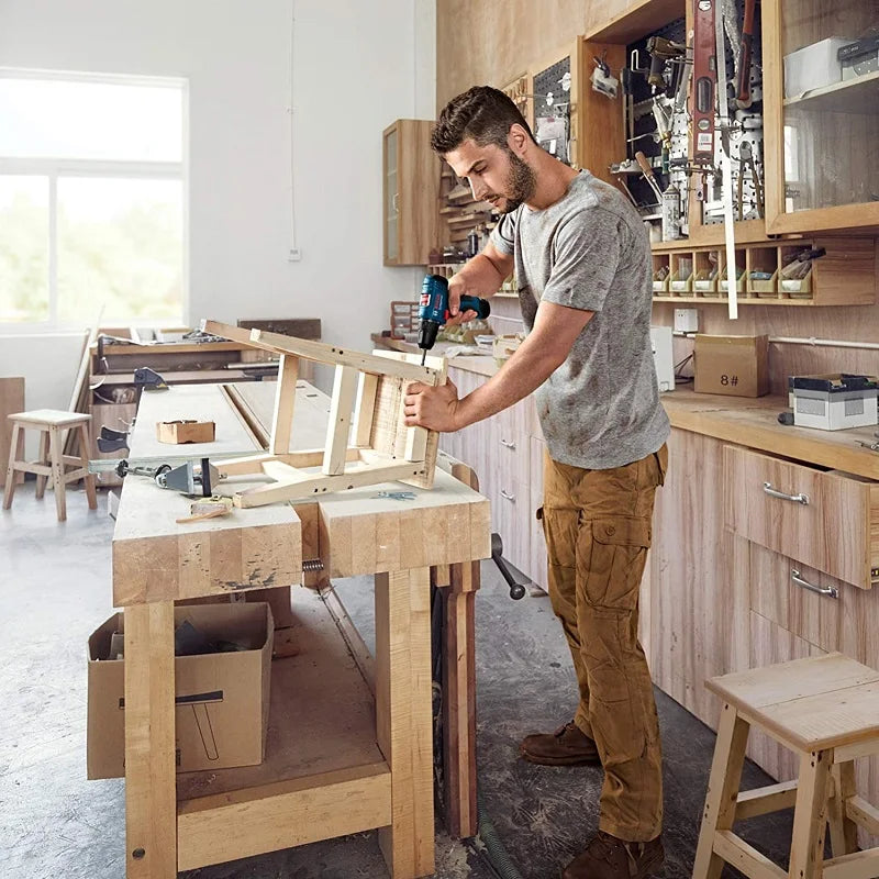 Bosch GSR 120-Li lifestyle use by a man in a workshop setting