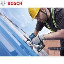 Bosch GDR 18V-215 lifestyle shot, worker using blue impact driver