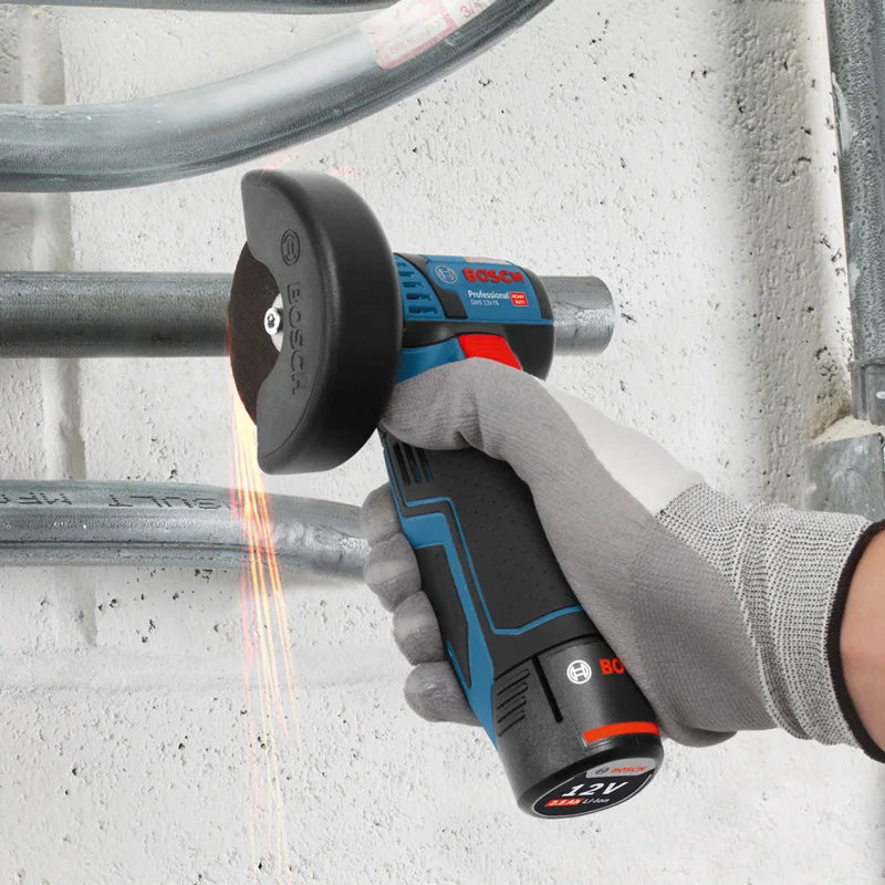Bosch GWS 12V-76 studio detail of cordless angle grinder cutting action