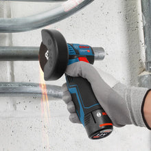 Bosch GWS 12V-76 studio detail of cordless angle grinder cutting action