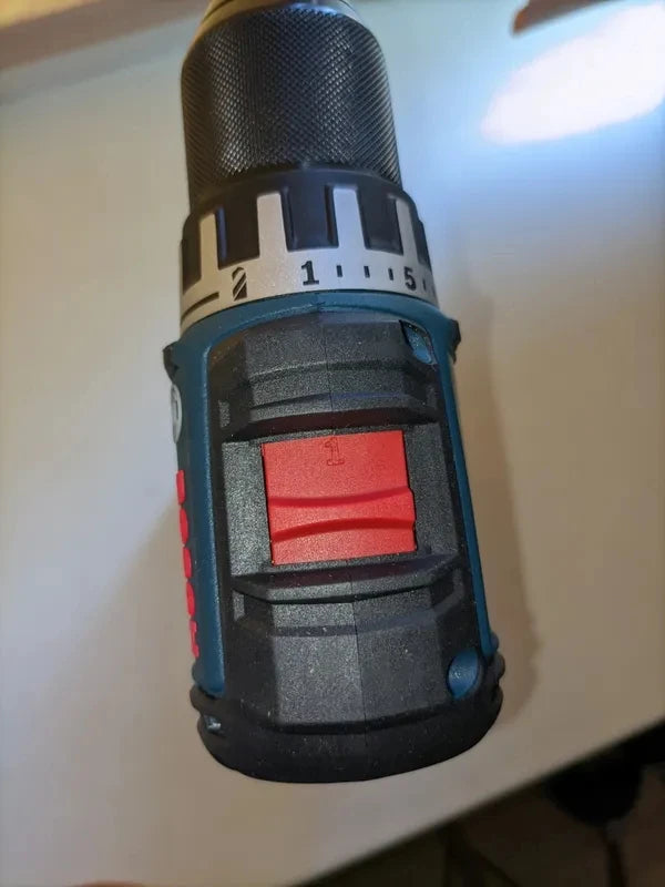 Bosch GSR18V-52 back view showing battery compartment, blue-black-red