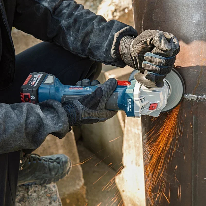 Bosch angle grinder lifestyle cutting metal outdoors, blue and black