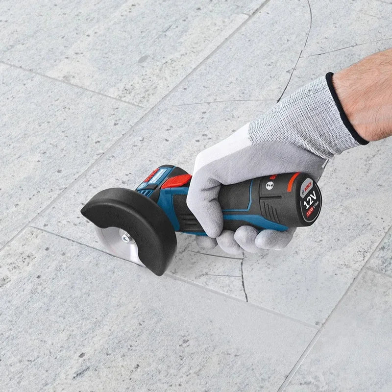 Bosch GWS 12V-76 packaging front view, compact cordless tool in blue and black