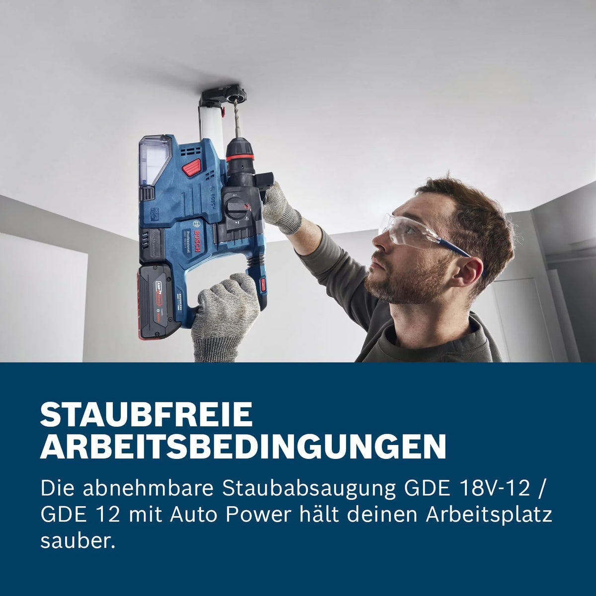 Bosch GBH 18V-22 X lifestyle shot, man using blue cordless rotary hammer
