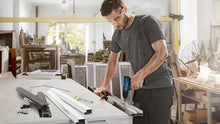 Bosch GSR 120-LI lifestyle shot, man working with cordless drill in workshop