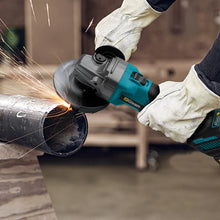 Gisam worker using angle grinder with protective gloves, lifestyle