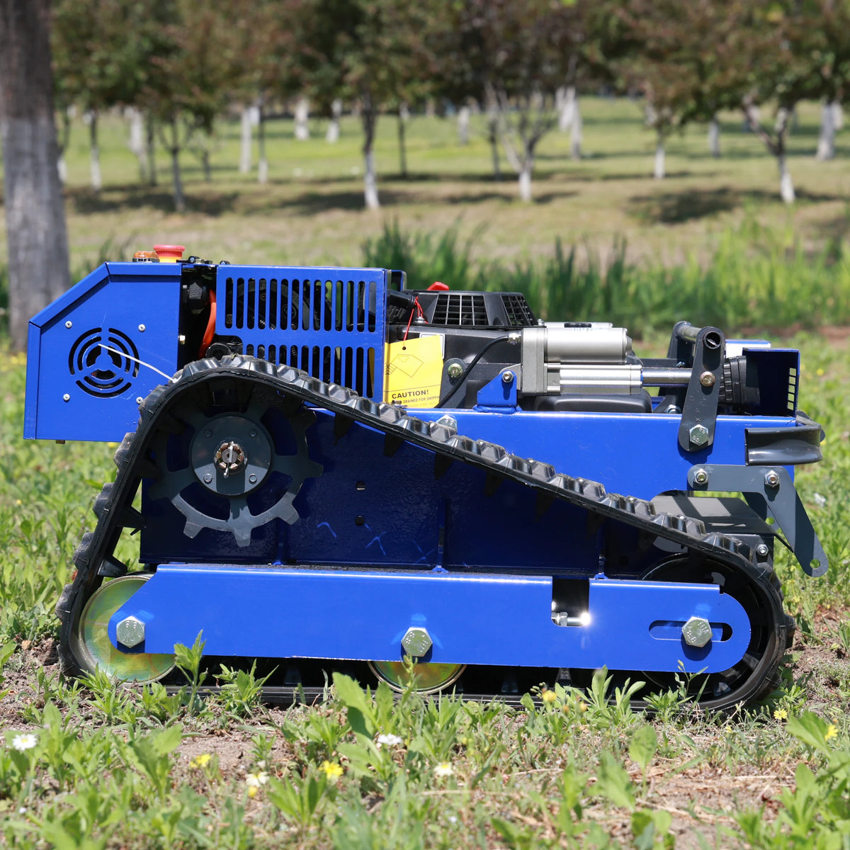 AIWEIYA remote control lawn mower, blue tracked vehicle control panel side view