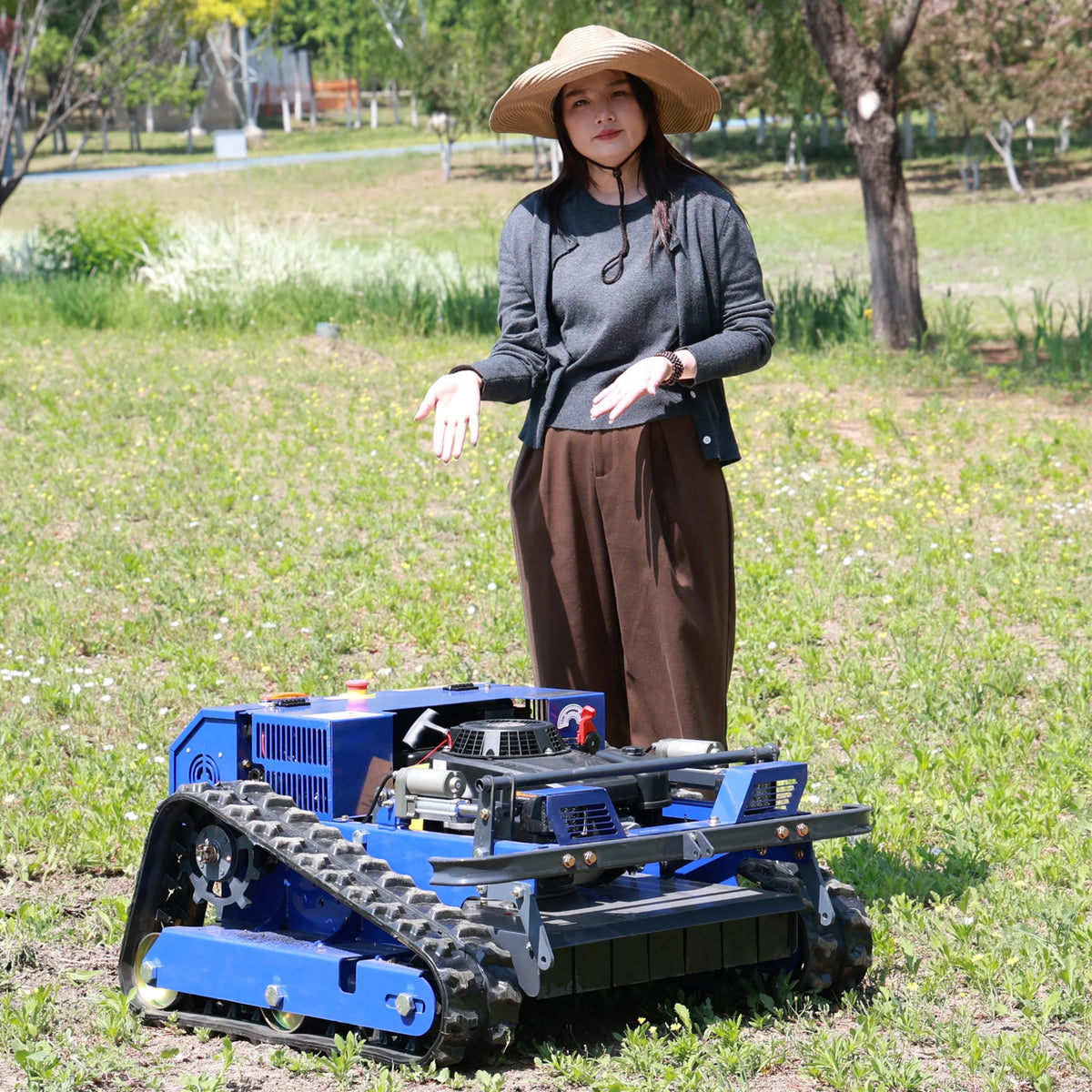 AIWEIYA remote control lawn mower, person with blue tracked vehicle