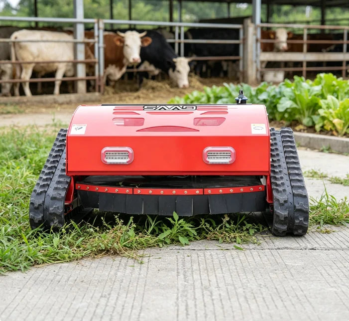 SAAO robot lawn mower front view, red and black tracked agricultural robot