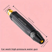 Close-up of compact spray nozzle in black and gold on solid background