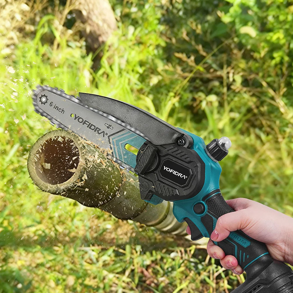 Yofidra handheld chainsaw lifestyle shot, ergonomic handle, cutting attachment