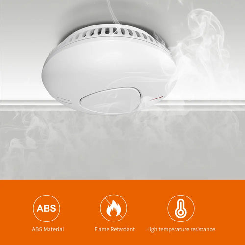 Smoke detector front view, compact design, white body with battery included