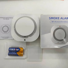 PGST wireless smoke detector package, white and gray, user manual included