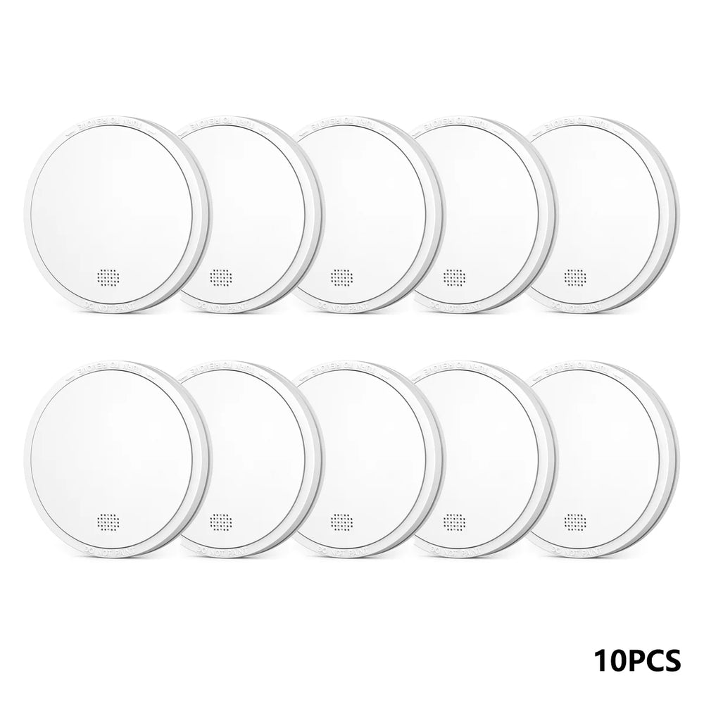 Independent smoke alarm detail, white round design on white background