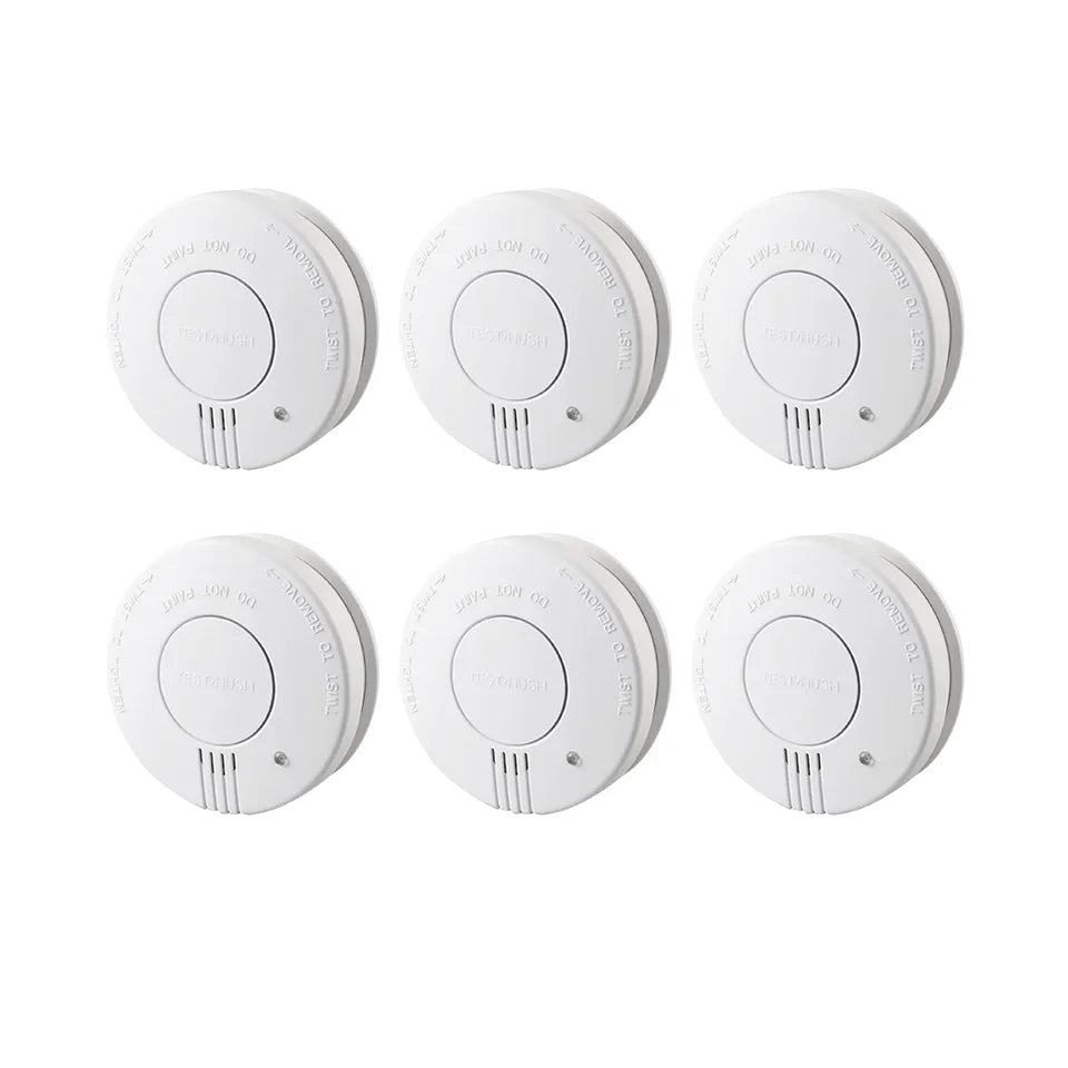 CCEsafety SA10 smoke detectors lifestyle shot with six white circular alarms