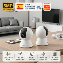 Kerui indoor PTZ WiFi camera lifestyle shot, white and black units