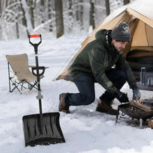 18 inch snow shovel present while preparing food outdoors