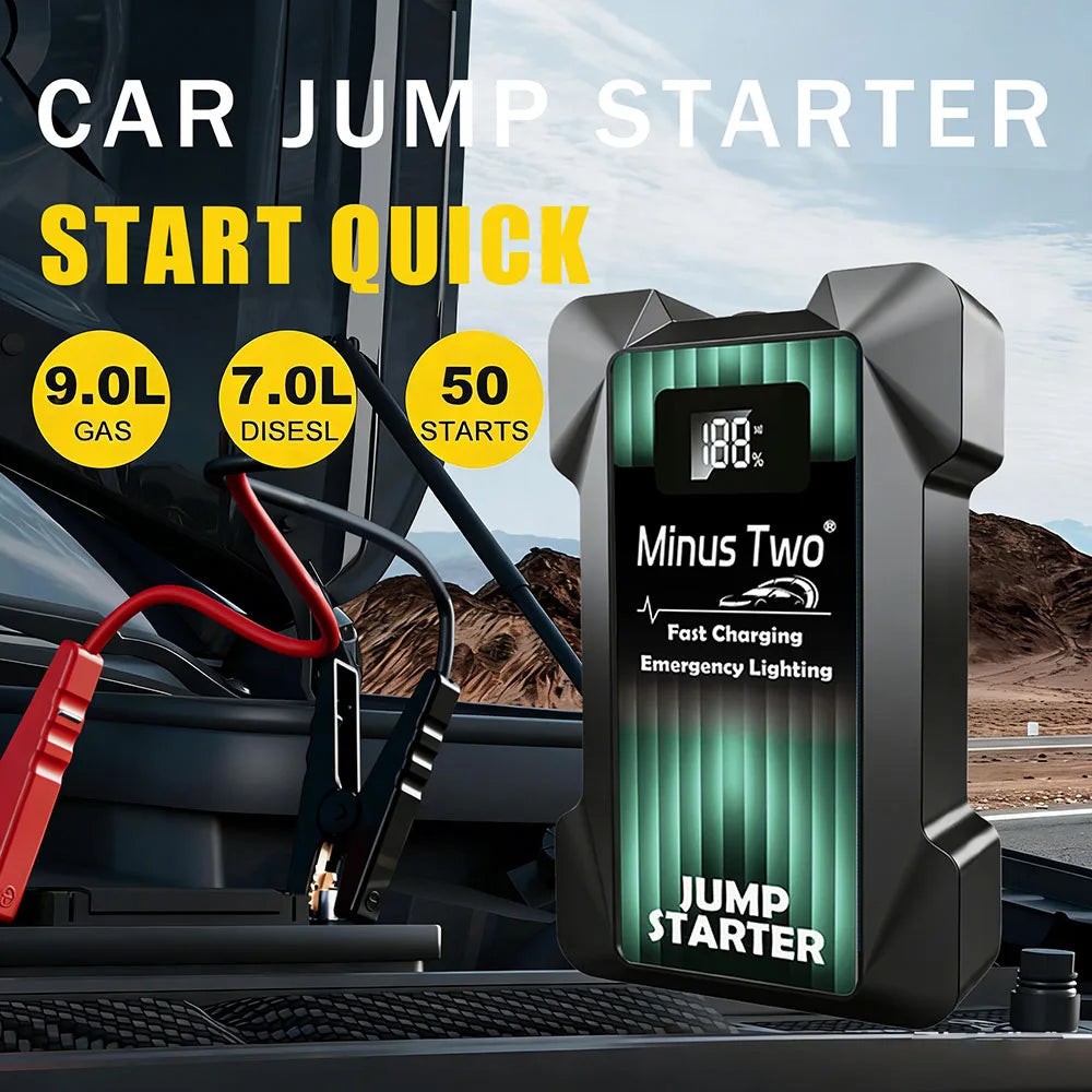Car jump starter in black and green with jumper cables, lifestyle shot.