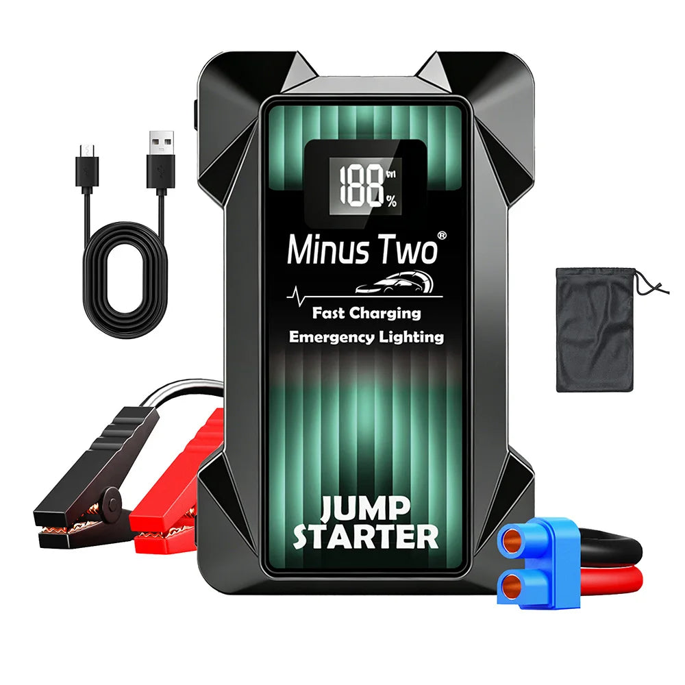 Car jump starter in black and green with USB charging, detail shot.