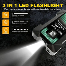 LED flashlight in black and green, detail shot.