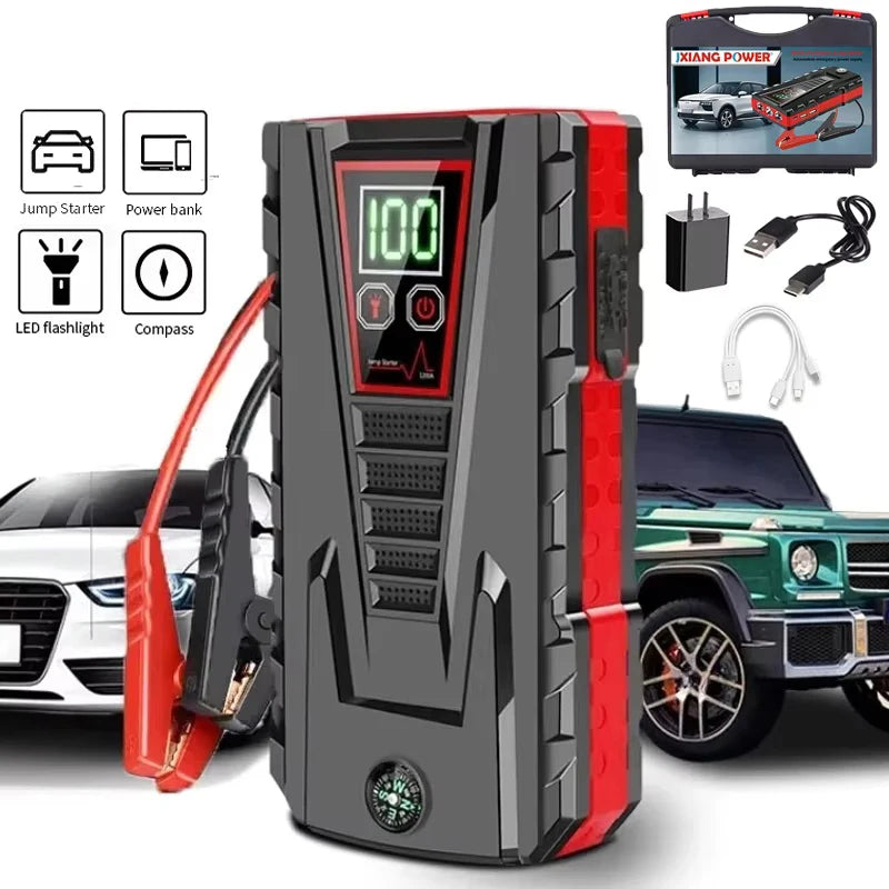 Portable car jump starter in black and red with digital display and jumper cables.