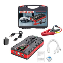Portable charger in black, grey, and red with digital display and multiple connectors.