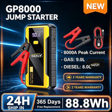 GKFLY car jump starter in black and yellow packaging with jumper cables and LED display