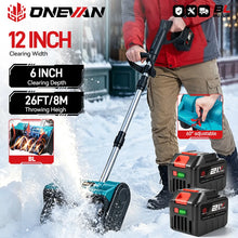ONEVAN snow shovel in blue and black, lifestyle shot outdoors