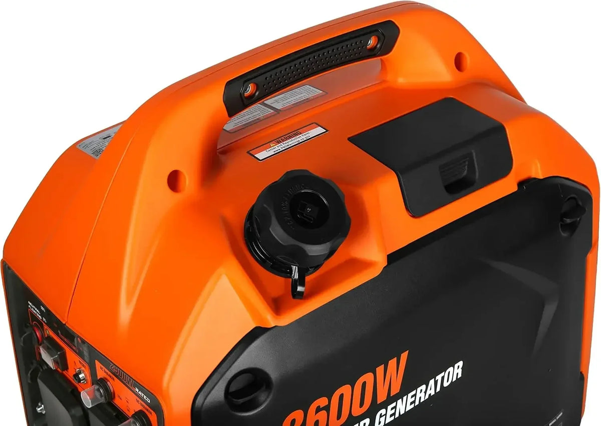 Detail view of the generator handle and fuel cap in orange and black.